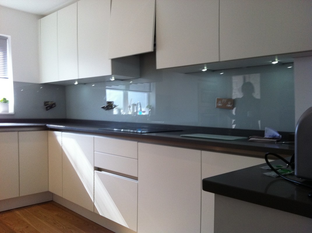 Grey glass kitchen splashback with LED lighting in Didcot