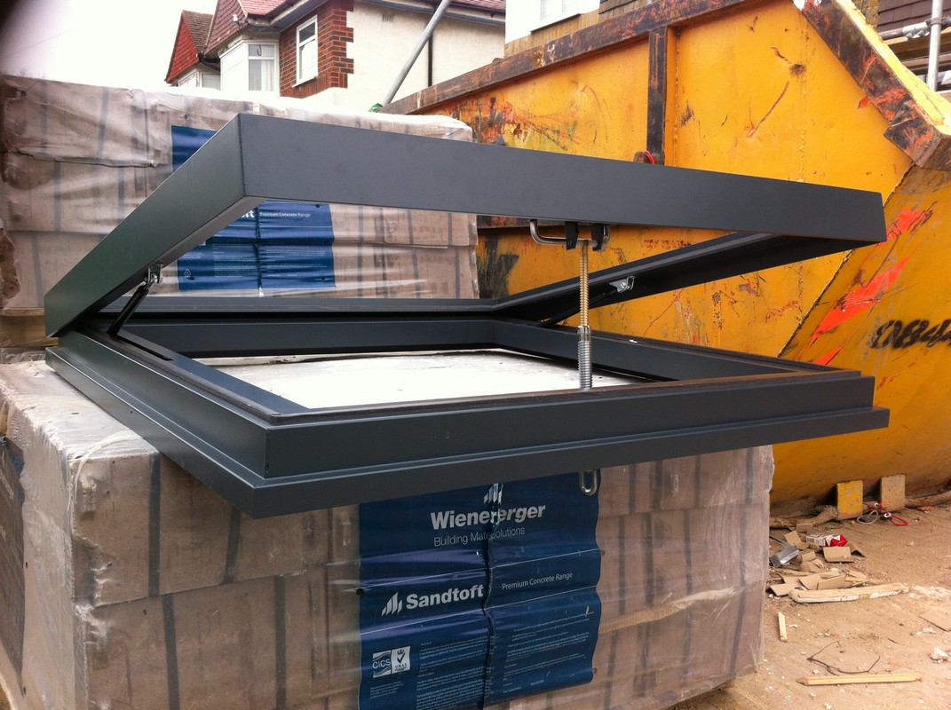 Opening flat roof skylight in anthracite grey installed in Didcot